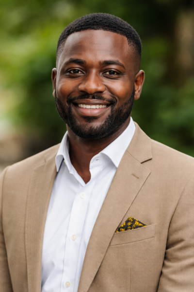 Professional portrait of Alimamy Umar Kamara, CEO of Tamaraneh Limited.